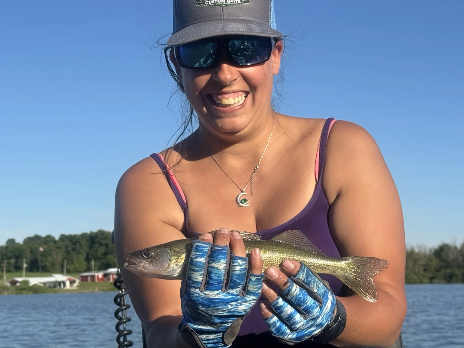 Angler holding a walleye